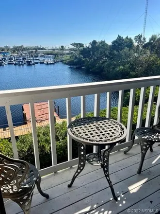 Buy this 2 bed townhouse on 129 Lagoon Court in New Smyrna Beach, FL 32169