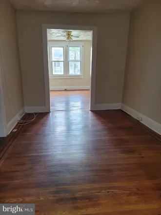Rent this 5 bed townhouse on 2219 Bryant Avenue in Baltimore, MD 21217