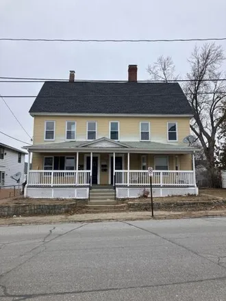 Buy this 7 bed townhouse on Silver Street South Back in Manchester, NH 03101