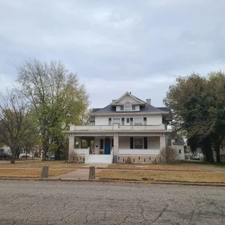 Buy this 5 bed house on 130 East Maple Street in Wellington, KS 67152