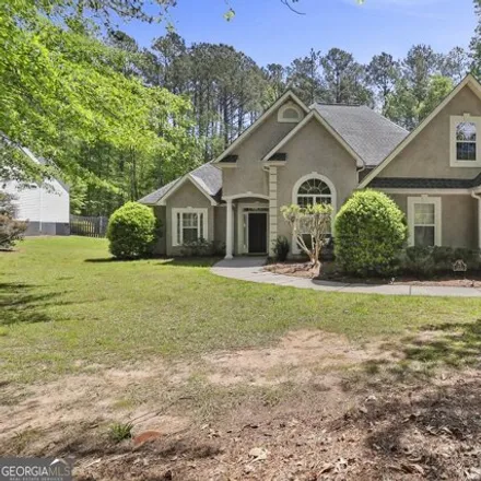 Rent this 4 bed house on 208 Westminster Village Boulevard in Coweta County, GA 30277