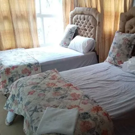 Rent this 4 bed house on Boca de Cumayasa in Ramón Santana, Dominican Republic