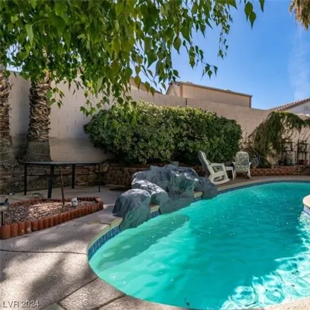 Buy this 4 bed house on 993 Broken Reed Court in Henderson, NV 89015