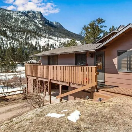 Buy this 4 bed house on 2952 Fall River Road in Estes Park, CO 80517