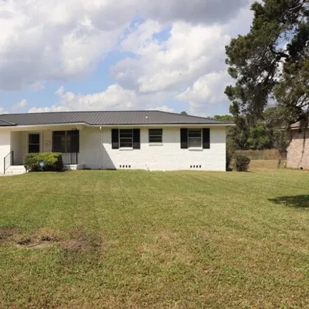 Buy this 4 bed house on 3055 Ribault Scenic Drive in Ribault Manor, Jacksonville