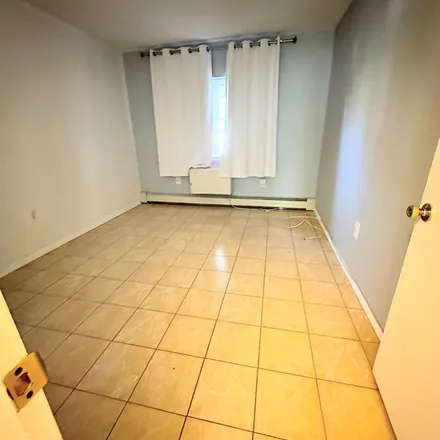Rent this 2 bed townhouse on 13 East 117th Street in New York, NY 10035