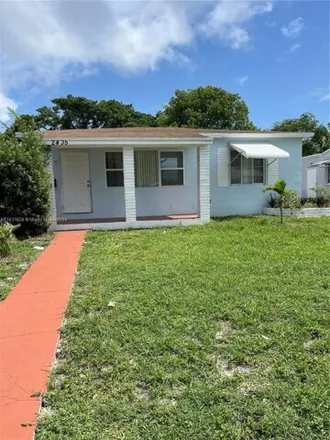 Rent this 4 bed house on 2435 Plunkett St in Hollywood, Florida