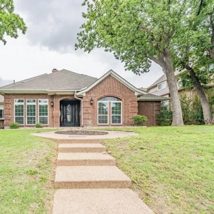 Buy this 4 bed house on 2105 Bay Club Drive in Arlington, TX 76013