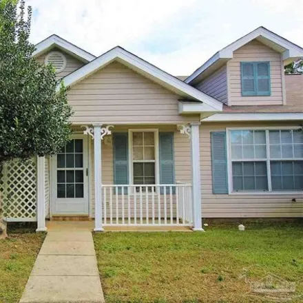 Rent this 2 bed townhouse on 8176 Heirloom Drive in Ensley, FL 32514