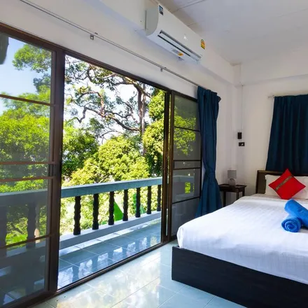Rent this 6 bed house on Villa Atchara Phuket Thailand. in ซอย พระบารมี 4, Patong