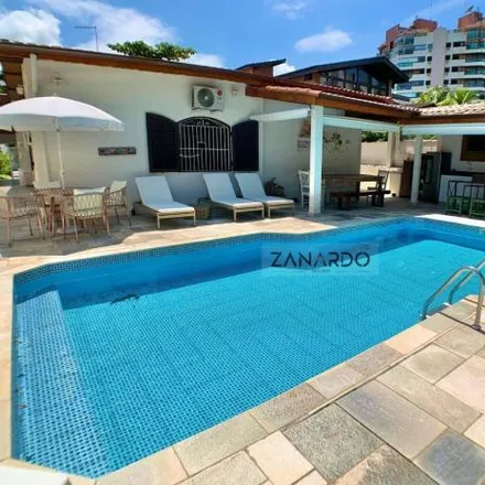 Rent this 6 bed house on Avenida da Riviera in Riviera, Bertioga - SP