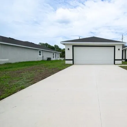 Buy this 3 bed house on 8316 103rd Ave in Vero Beach, Florida