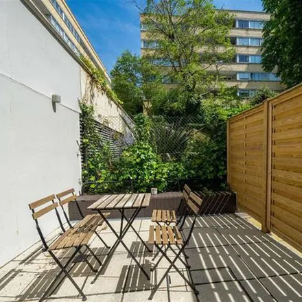 Rent this 4 bed townhouse on 1-14 Porchester Mews in London, W2 6AG