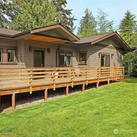 Buy this 4 bed house on 11804 9th Avenue Northwest in Seattle, WA 98177