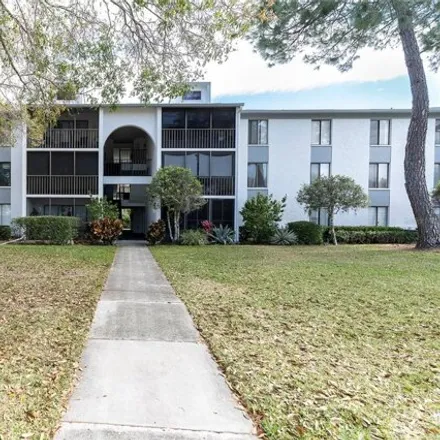 Buy this 2 bed condo on 1334 Pine Ridge Circle East in East Lake, FL 34688