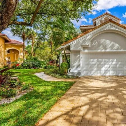 Buy this 4 bed house on 516 Misty Oaks Drive in Pompano Beach, FL 33069