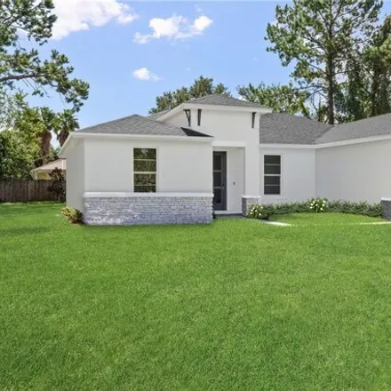 Buy this 4 bed house on 7115 SW 128th St in Ocala, Florida