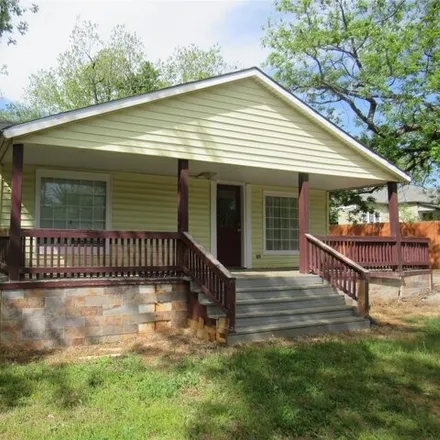 Buy this 4 bed house on 1365 Bullock Street in Denison, TX 75020