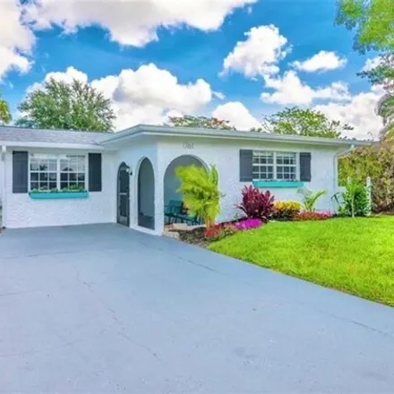 Buy this 5 bed house on 761 95th Avenue North in Collier County, FL 34108