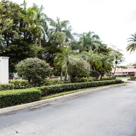 Rent this 3 bed townhouse on 10251 Via Hibiscus in Mission Bay, Palm Beach County