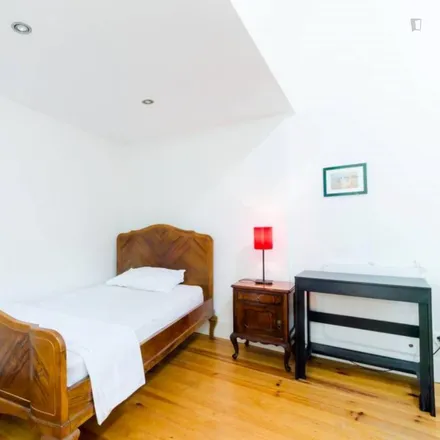 Rent this 4 bed room on Airbnb in Rua do Carrião, 1150-251 Lisbon