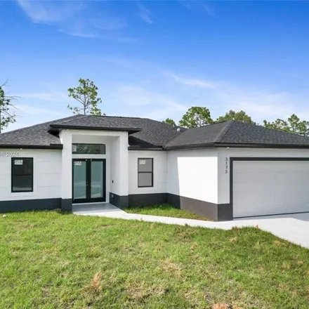 Buy this 3 bed house on 3188 Sunshine Boulevard North in Lehigh Acres, FL 33971