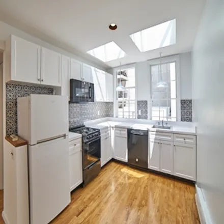 Rent this 3 bed apartment on 402 E 76th St