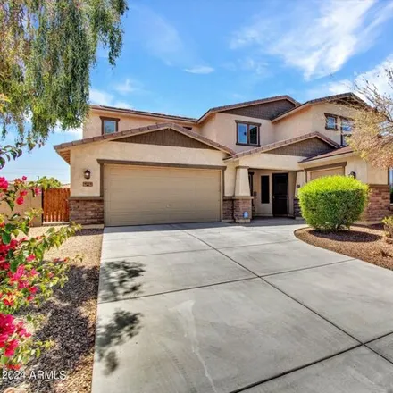 Buy this 4 bed house on 18225 W Mackenzie Dr in Goodyear, Arizona