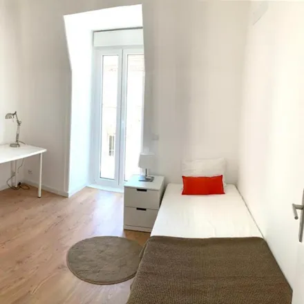 Rent this 6 bed room on Rua Morais Soares 54 in 1900-462 Lisbon, Portugal