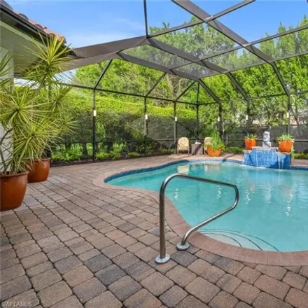 Buy this 4 bed house on 4953 Rustic Oaks Circle in Collier County, FL 34105