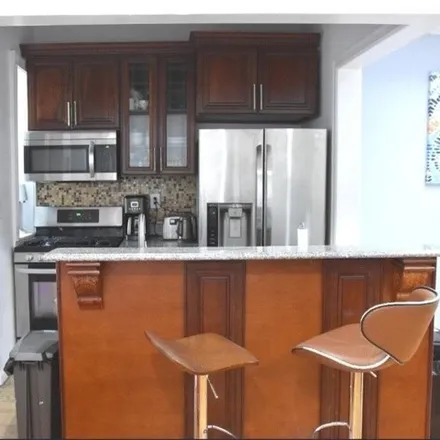 Rent this 4 bed house on 267 East 32nd Street in New York, NY 11226