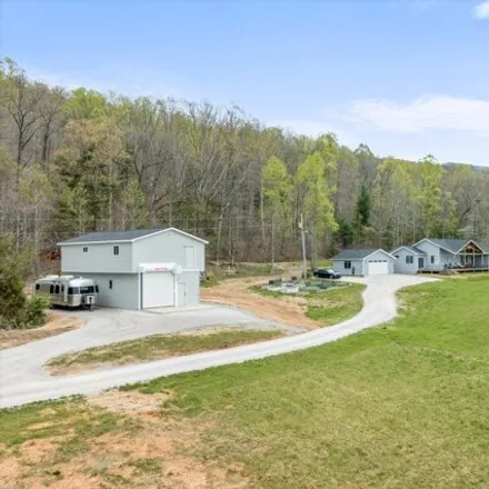 Buy this 4 bed house on 935 Bat Town Rd in Crab Orchard, Tennessee