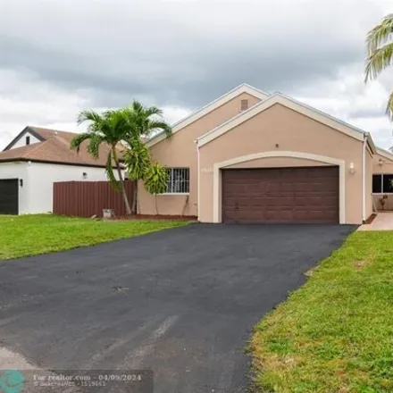 Buy this 4 bed house on 19015 Northwest 80th Court in Hialeah Gardens, FL 33015