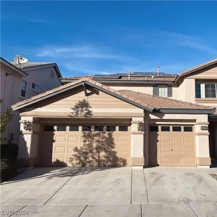 Rent this 4 bed house on 10942 Onslow Court in Summerlin South, NV 89135