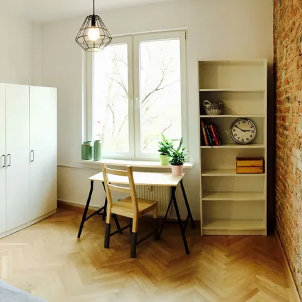 Rent this 4 bed room on Żytnia 75/77 in 01-149 Warsaw, Poland