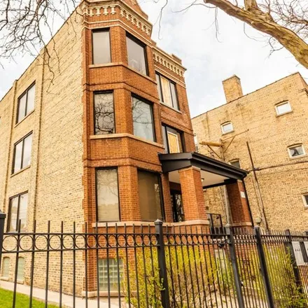 Rent this 2 bed house on 2542 N Harding Ave Apt 3 in Chicago, Illinois