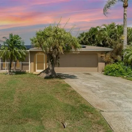 Buy this 3 bed house on 1407 Southeast 33rd Street in Cape Coral, FL 33904
