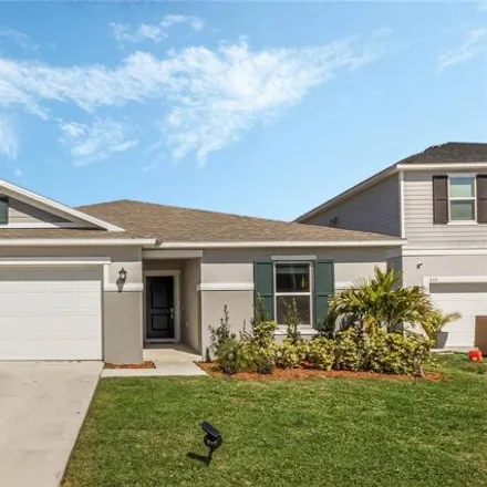 Rent this 4 bed house on Overpool Avenue in Osceola County, FL 33897