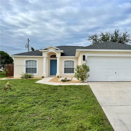Rent this 3 bed house on 1621 Southwest Boykin Avenue in Port Saint Lucie, FL 34953