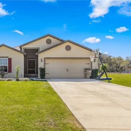 Buy this 5 bed house on 12082 Callicarpa Lane in Mid Florida Lakes, Lake County