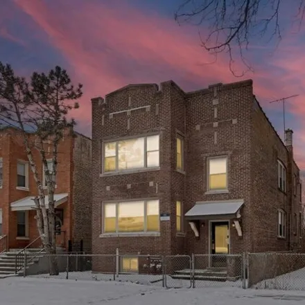Buy this 4 bed house on 7204 South Cornell Avenue in Chicago, IL 60649