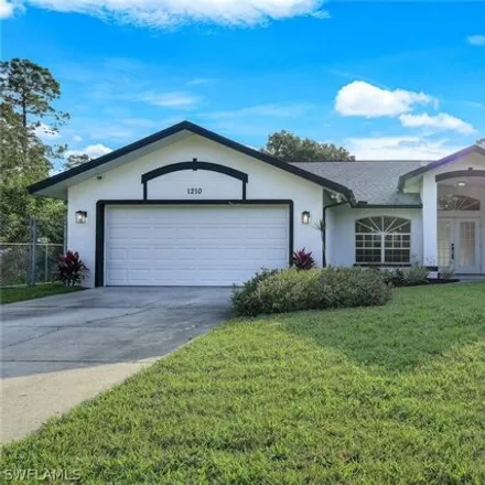 Buy this 3 bed house on 1278 Irving Avenue in Lehigh Acres, FL 33972