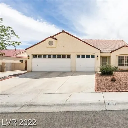 Buy this 3 bed house on 1711 Ridosh Circle in North Las Vegas, NV 89032