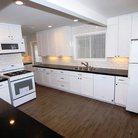 Rent this 3 bed apartment on 6157 Faculty Avenue in Lakewood, CA 90712