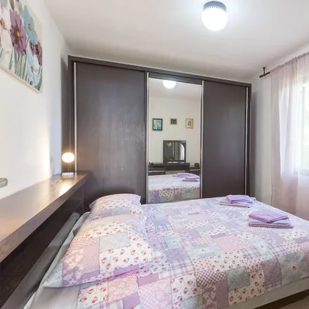 Rent this 4 bed house on 21325 Tučepi