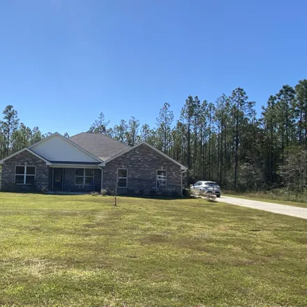 Buy this 4 bed house on 28499 Forest Boulevard in Harrison County, MS 39571