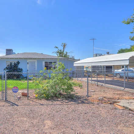 Buy this 3 bed house on 109 5th Avenue East in Buckeye, AZ 85326