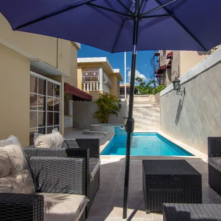 Rent this 4 bed house on Calle Coral Negro in Corales del Sur, Santo Domingo Este