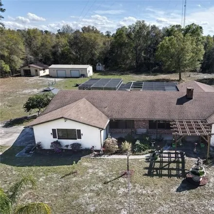 Buy this 4 bed house on 1100 West Blue Springs Avenue in Orange City, Volusia County