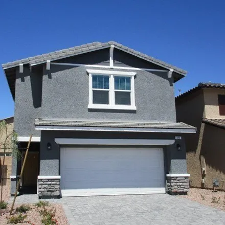 Rent this 4 bed house on Canary Song Drive in Henderson, NV 89011